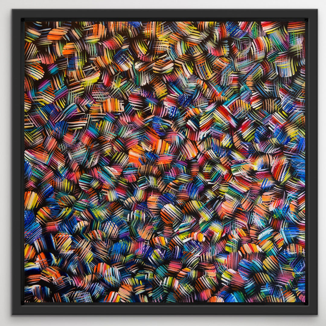 Whirling Rainbows original abstract painting in a black wooden floating frame.