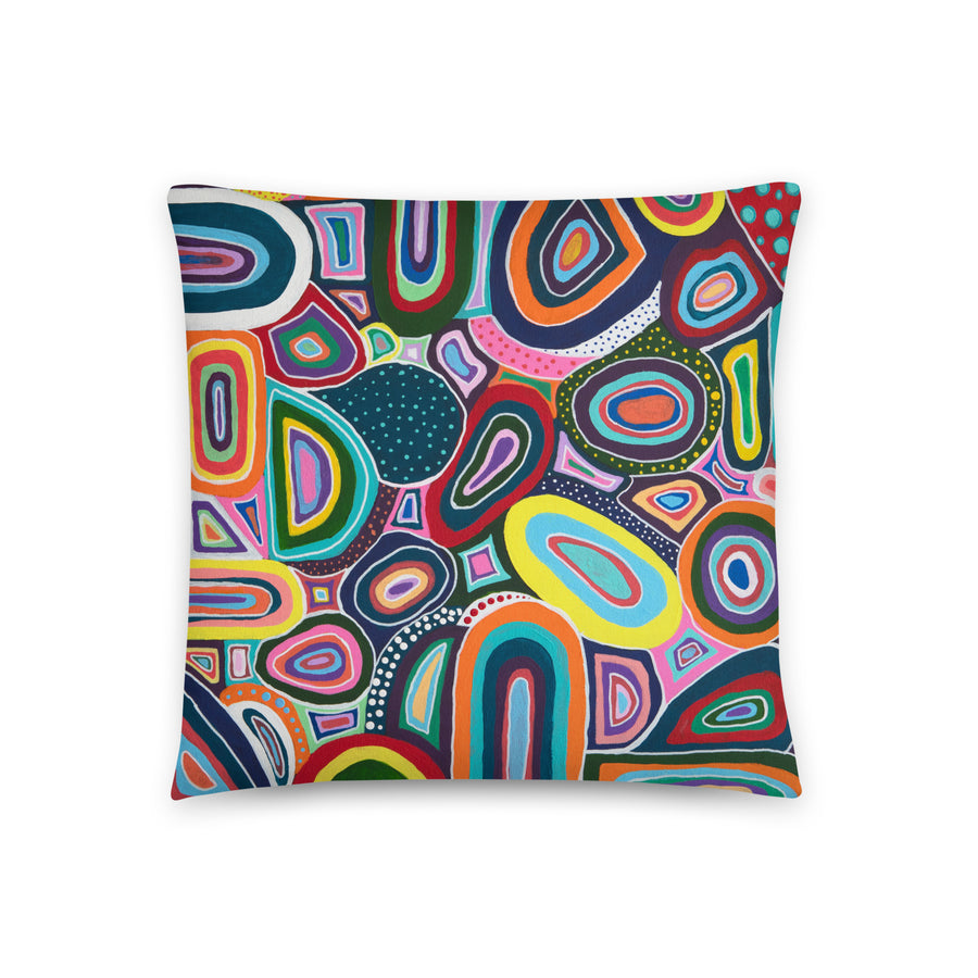 Folk art pillow 18 by 18 inches on white background.