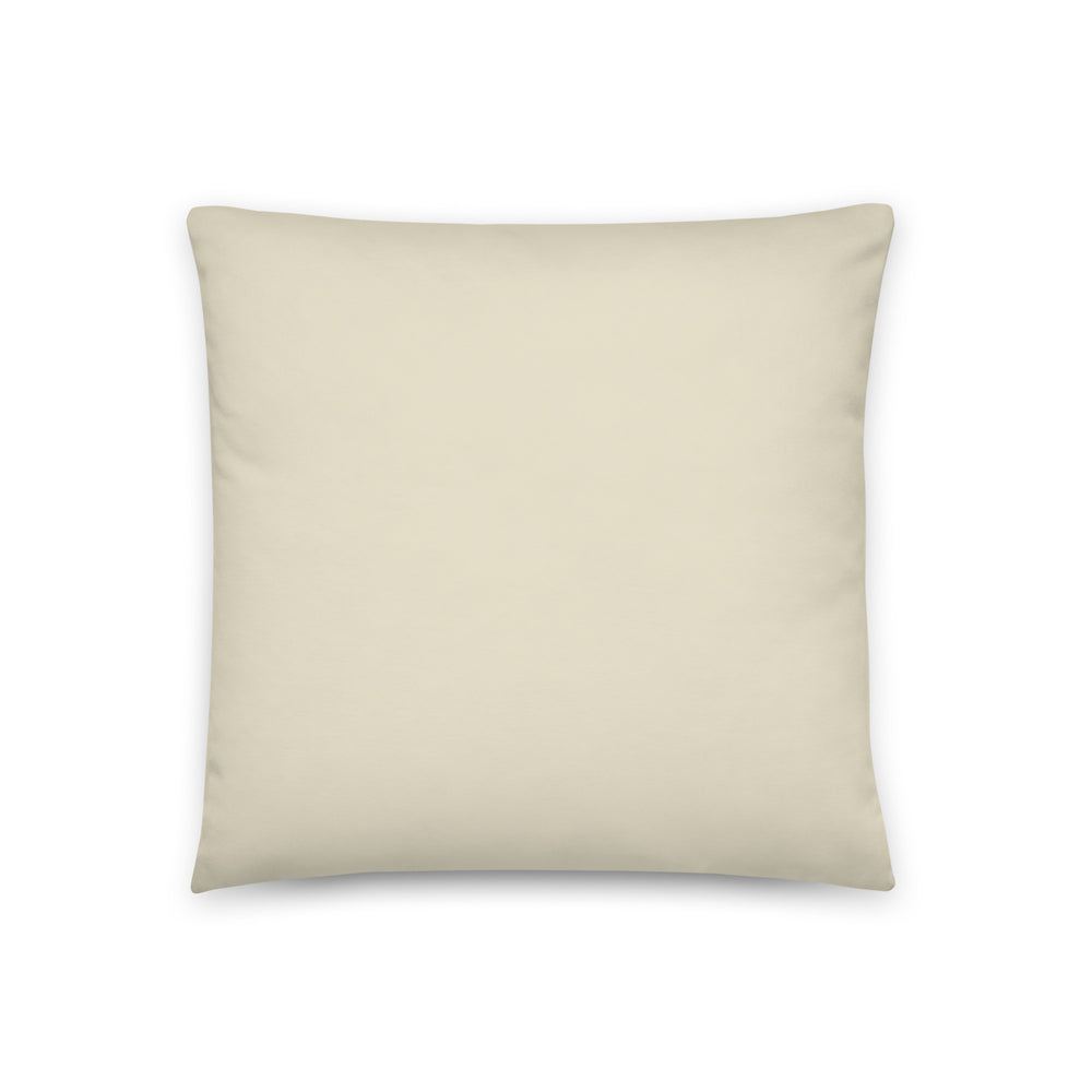 Back view of solid beige throw pillow from the atomic cat collection.